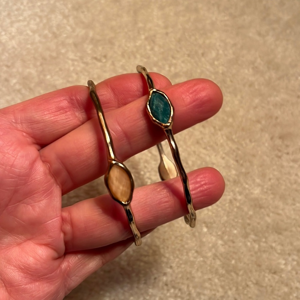 2bracelets no markings costume with pinkish and blue/green insets